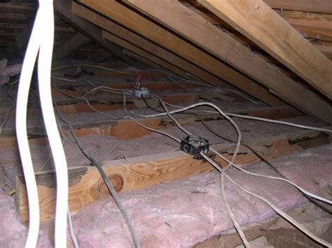 biggest junction box in attic|attic junction box under insulation.